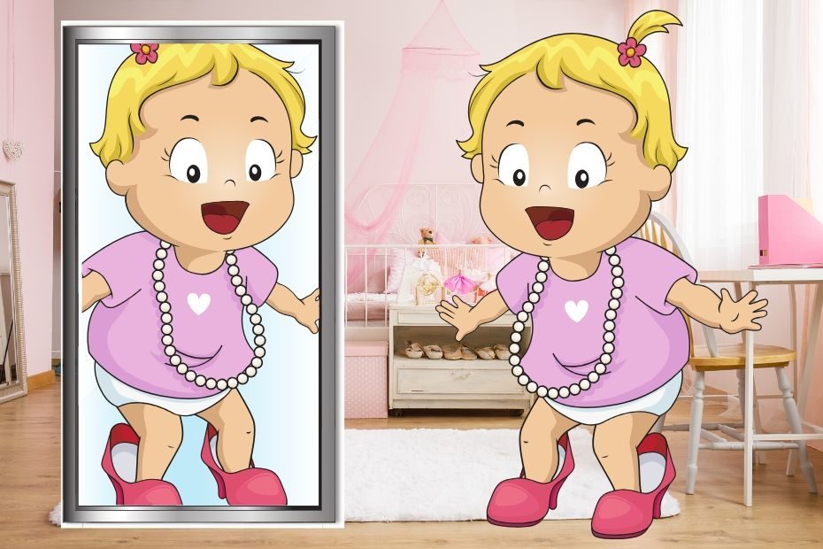 toddler girl wearing pink high heels looking in mirror