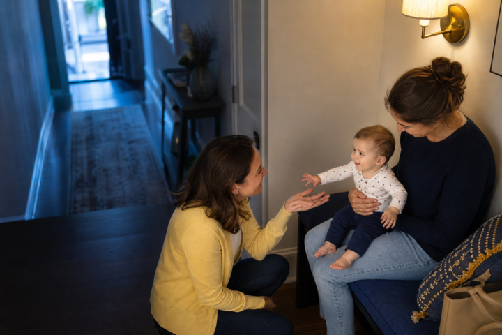 Editorial scene illustrating how sleep training changed my baby's personality in a bright home setting.